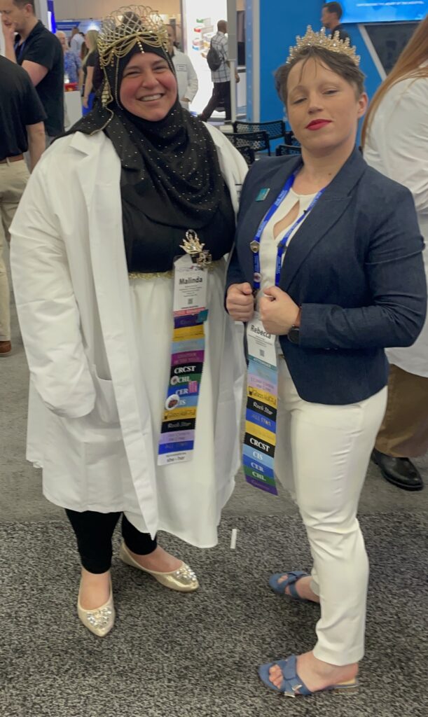 Elammari takes selfies with fellow “Crownies” at the HSPA’s 2024 Annual Meeting. 